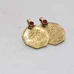Our Arabic Gold Coin Earrings are a unique and sophisticated cultural statement, showcasing the rich heritage of the Iran Islamic State through a meticulously crafted gold coin design featuring a date palm tree.