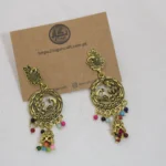 Discover our exquisite Ladies Artificial Earrings, featuring intricate peacock motifs and ornate designs. Elevate your style with these captivating accessories today!