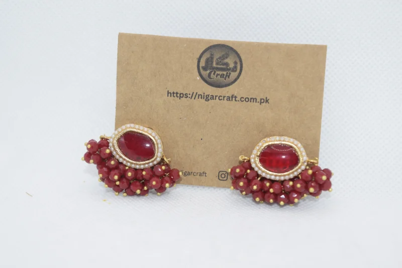Elevate your style with our Red Kundan Earrings, showcasing intricate designs and vibrant gemstones. Experience classic elegance that complements any outfit.