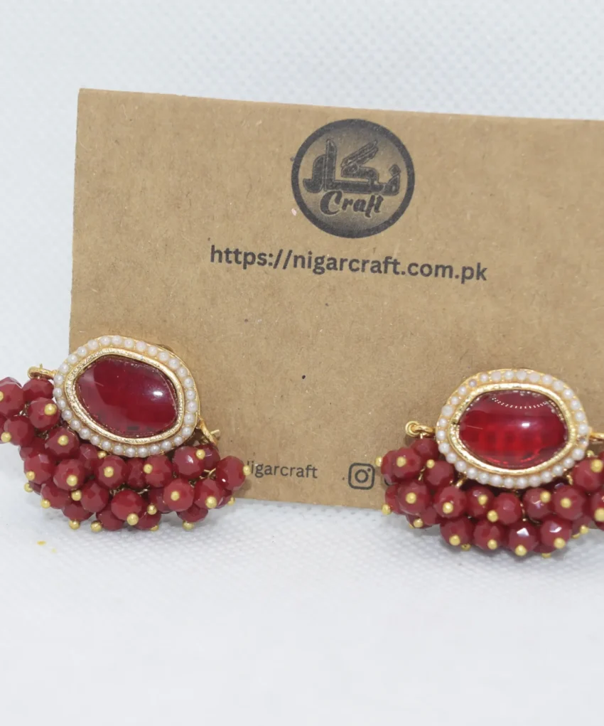 Elevate your style with our Red Kundan Earrings, showcasing intricate designs and vibrant gemstones. Experience classic elegance that complements any outfit.