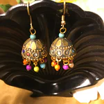 Discover the breathtaking evolution of Gold Jhumki designs, where ancient tradition meets vibrant, modern artistry.