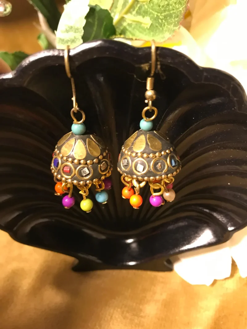 Discover the breathtaking evolution of Gold Jhumki designs, where ancient tradition meets vibrant, modern artistry.