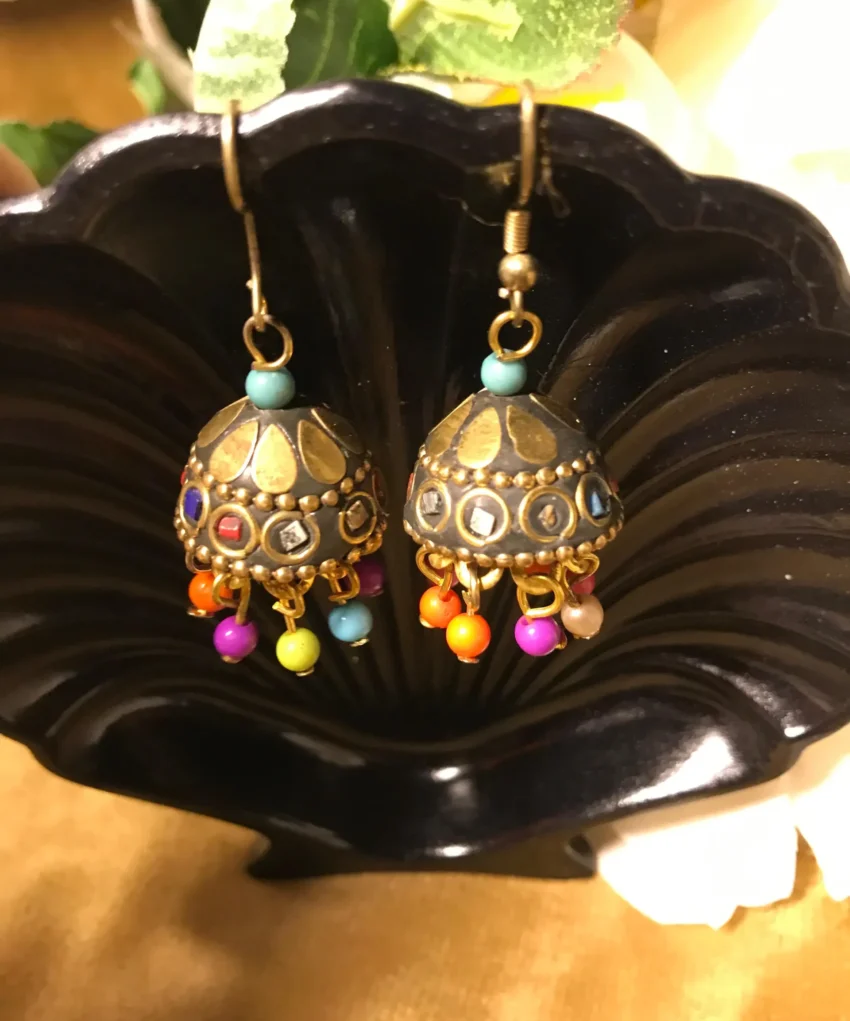 Discover the breathtaking evolution of Gold Jhumki designs, where ancient tradition meets vibrant, modern artistry.