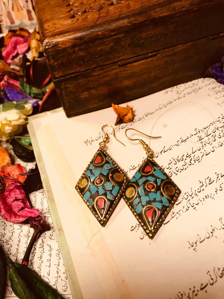 Discover allure of green stone earrings, blending regal sophistication with vibrant charm. Elevate your festive jewelry collection with timeless craftsmanship.
