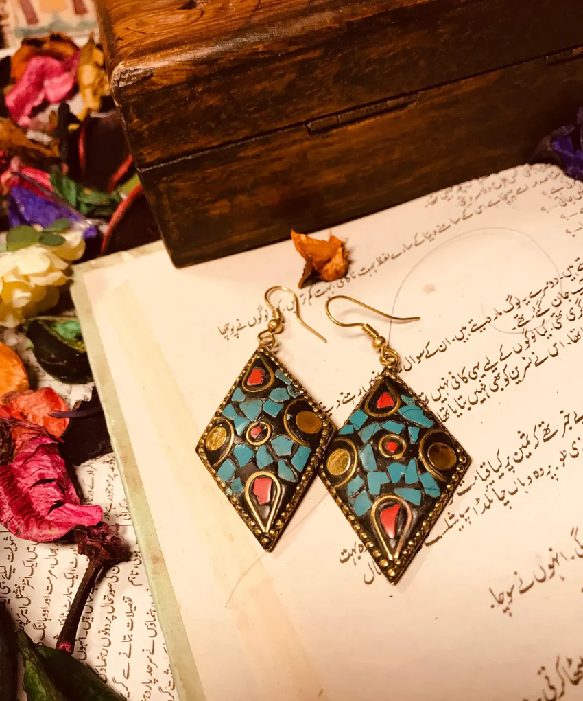 Discover allure of green stone earrings, blending regal sophistication with vibrant charm. Elevate your festive jewelry collection with timeless craftsmanship.