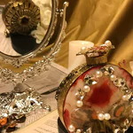 Elevate your style with our exquisite rose gold clutch bag. Featuring intricate detailing and a dual-sided design, it’s the perfect accessory for any formal event.