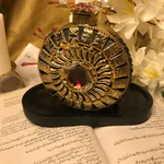 Elevate your style with our exquisite rose gold clutch bag. Featuring intricate detailing and a dual-sided design, it’s the perfect accessory for any formal event.