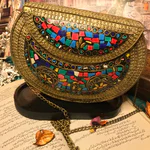 Elevate your style with this stunning Large Gold Clutch Bag , a masterpiece of wearable art showcasing intricate mosaic designs and a luxurious metallic sheen (1)