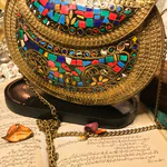 Elevate your style with this stunning Large Gold Clutch Bag , a masterpiece of wearable art showcasing intricate mosaic designs and a luxurious metallic sheen (1)