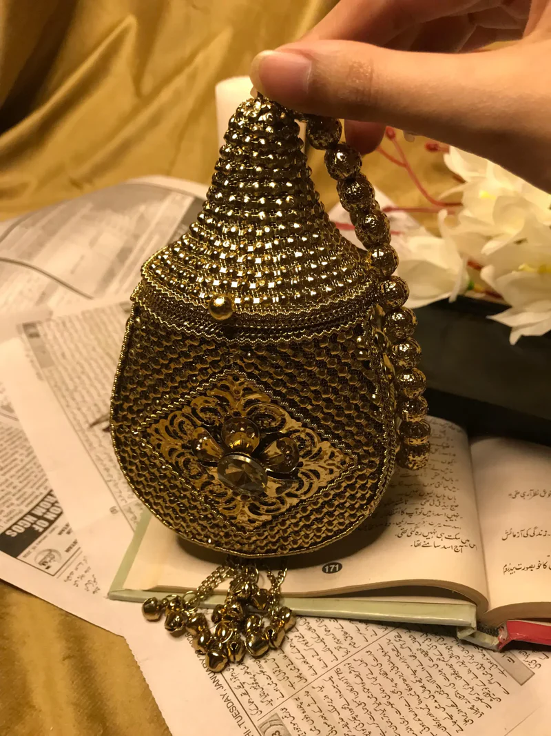 Precious Golden Metal Clutch