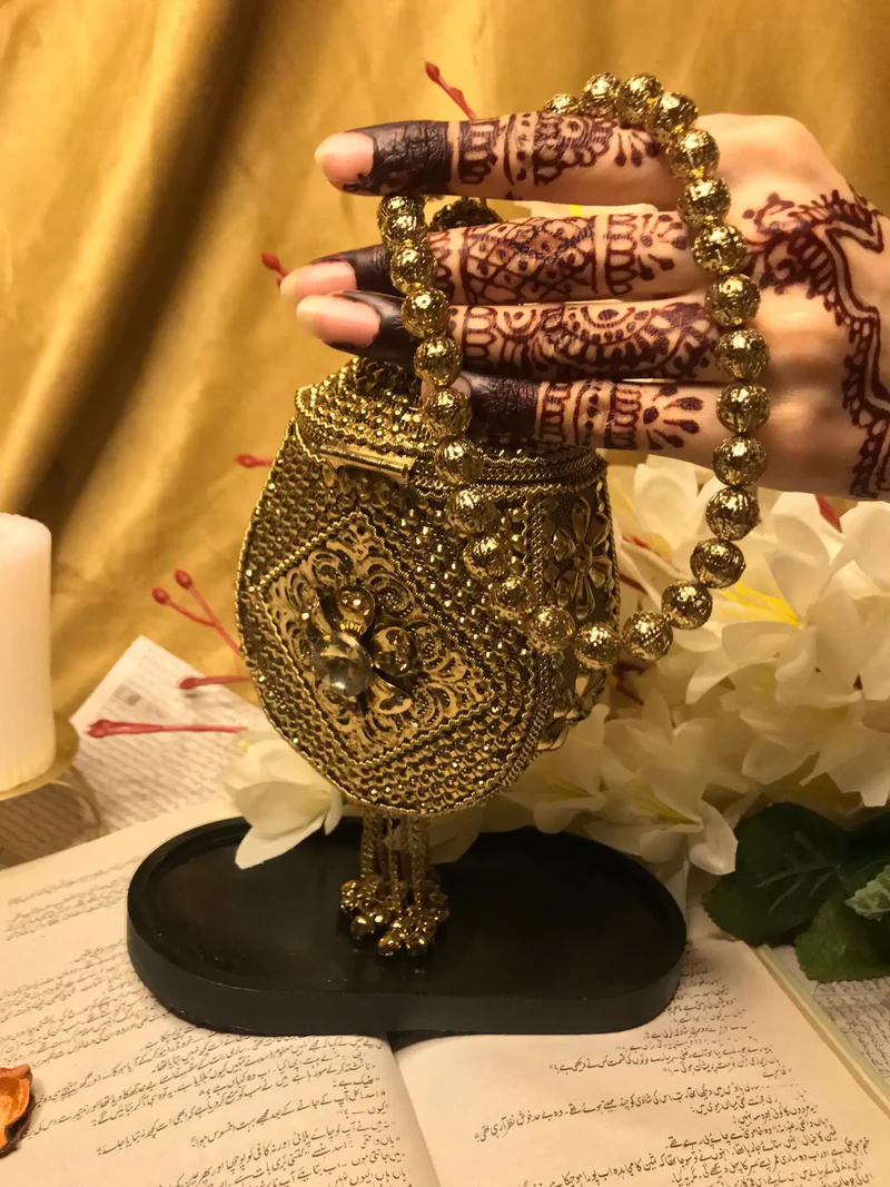 Precious Golden Metal Clutch
