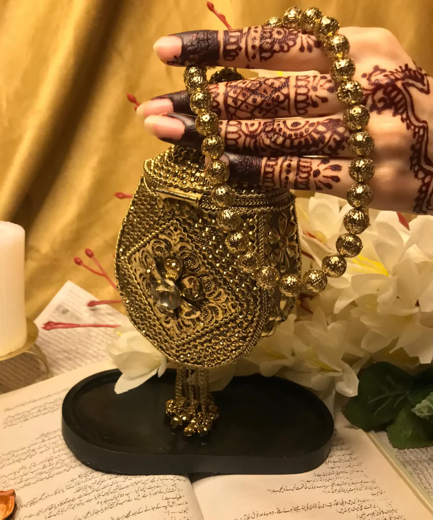 Precious Golden Metal Clutch